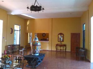 Habitación rústica en hostal de Cobá y Tulum